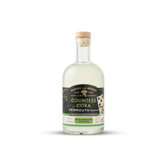 Bottle of Countess Cora Vermouth on a white background
