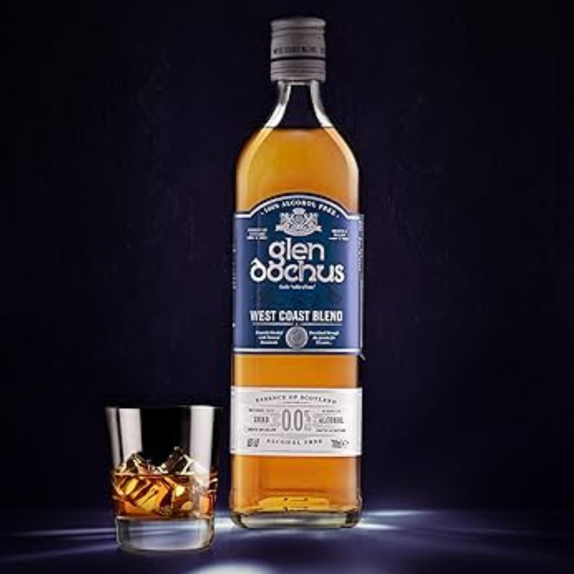 Glen Dochus whisky bottle with a glass of whisky on a dark background
