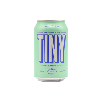 Green can of 'Tiny But Mighty' non-alcoholic beer on a white background