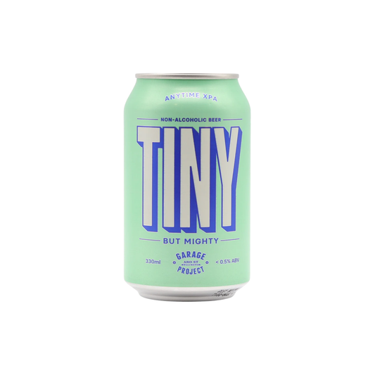 Green can of 'Tiny But Mighty' non-alcoholic beer on a white background